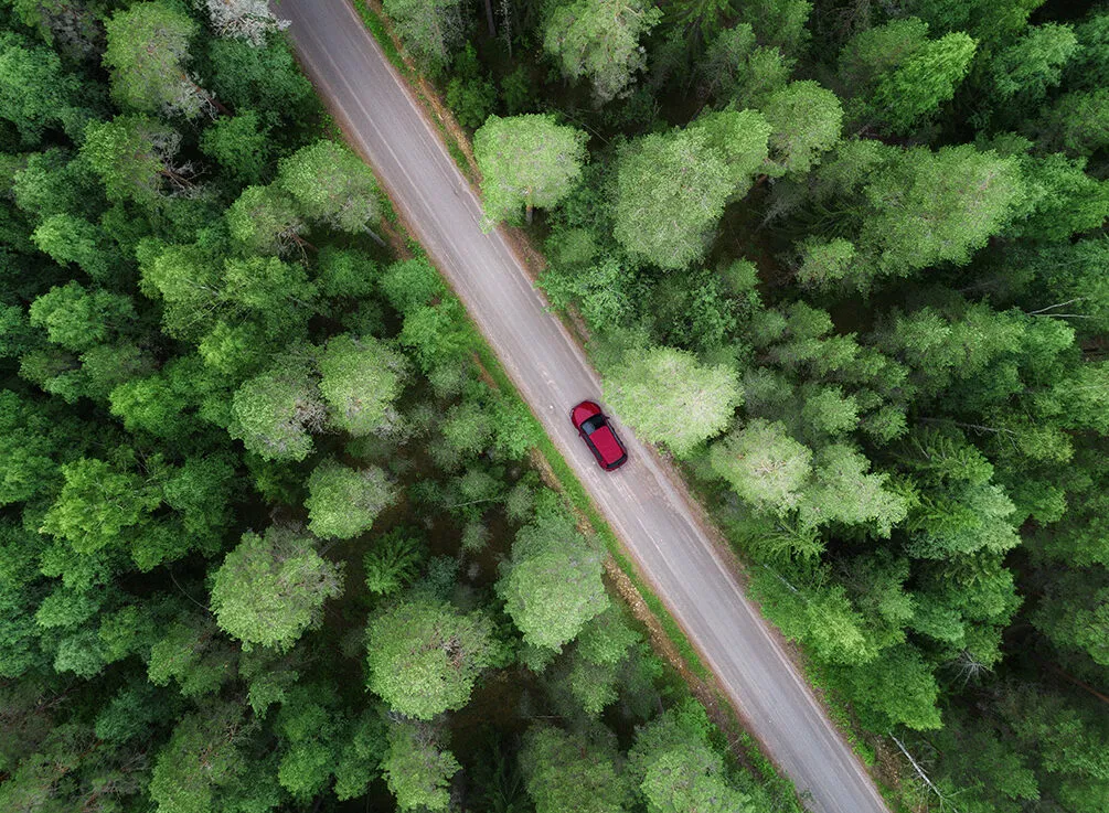 Car on the road searching for WEX Motorpass locations to refuel