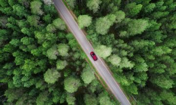 Car on the road searching for WEX Motorpass locations to refuel