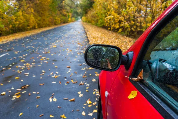 Car receiving roadside assistance using WEX Motorpass fuel card for support.