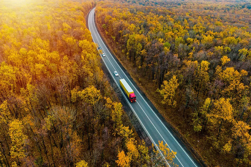 Truck driving to a WEX Motorpass location for refueling with WEX Motorpass fuel cards