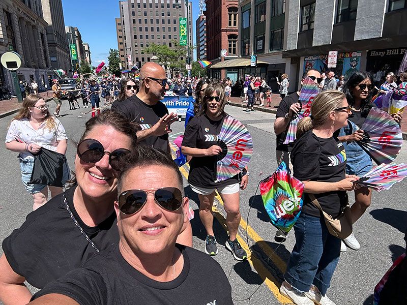 Pride parade Portland Maine WEX marching