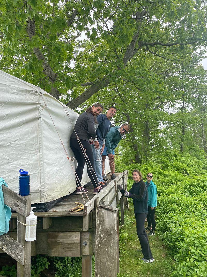 WEXers arriving on Cow Island for a day of volunteering and team building