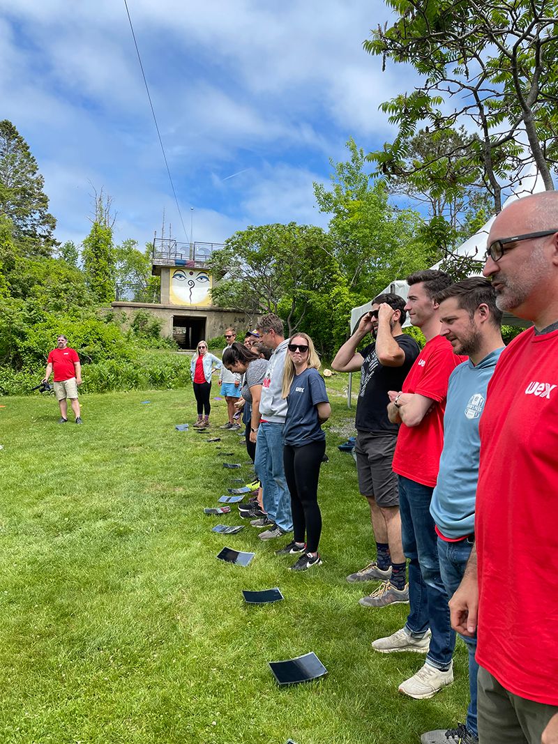 WEXers arriving on Cow Island for a day of volunteering and team building