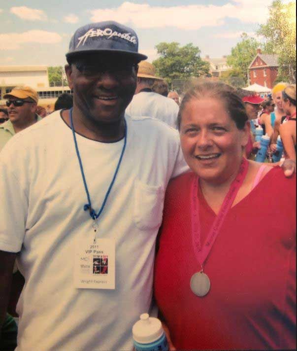 Lynn Alexander, with her husband James Alexander, after completing Maine’s Tri for a Cure in 2011
