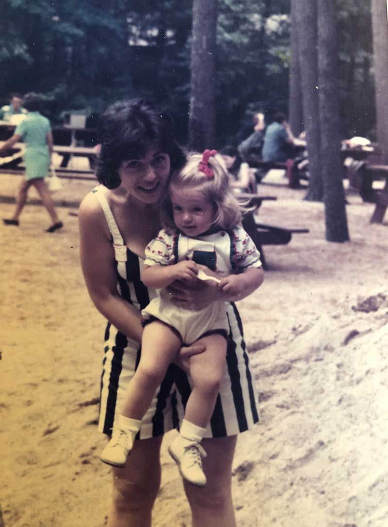 Lynn Alexander as a little girl in her mom’s arms.