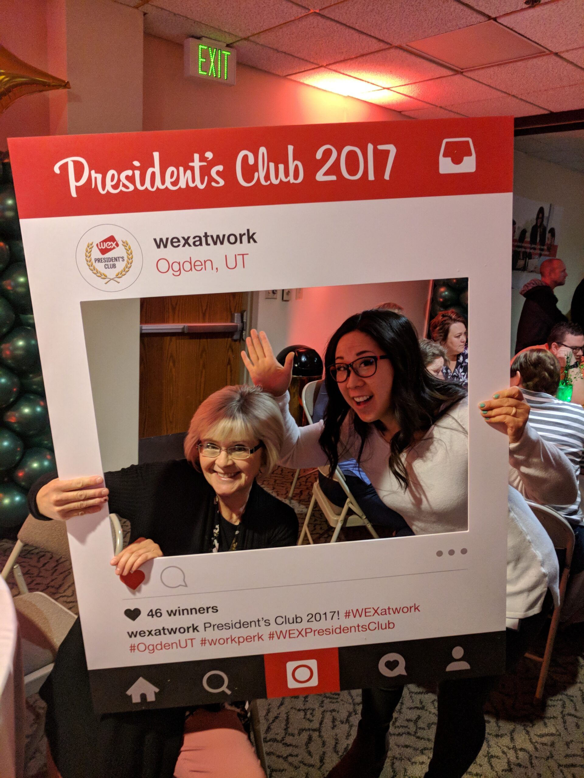 WEX employees with Instagram frame at President's Club