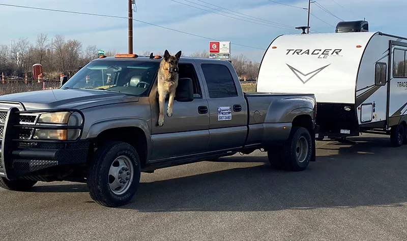Tucker and Bicknell hauling a Tracer RV