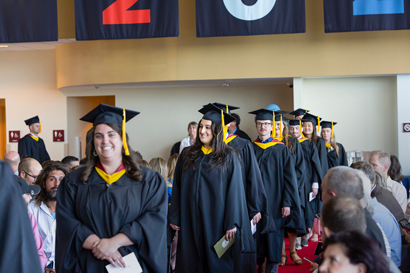 Class of 2022 marching during Roux graduation