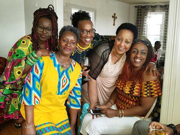 WEX's Liliane Ruvakubusa with Local Friends