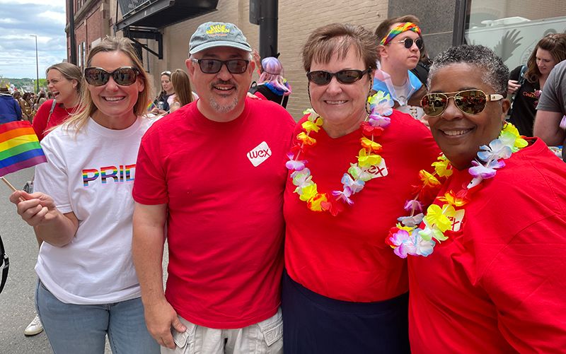 Veteran WEXers of 25 years and 29 years gathering with colleagues for the march