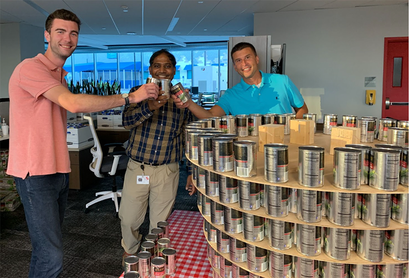 WEXers building a cupcake out of cans