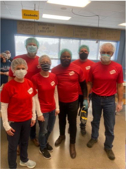 WEXers volunteering at Feed My Starving Children in Chanhassen, Minnesota