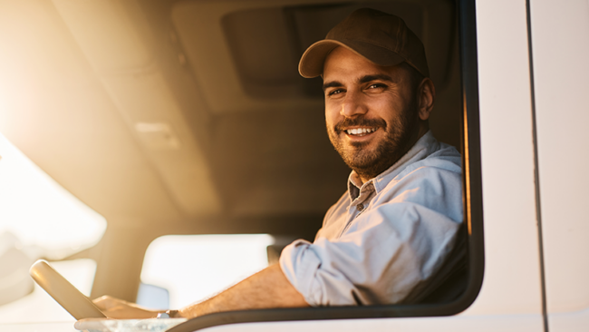 Truck driver in window