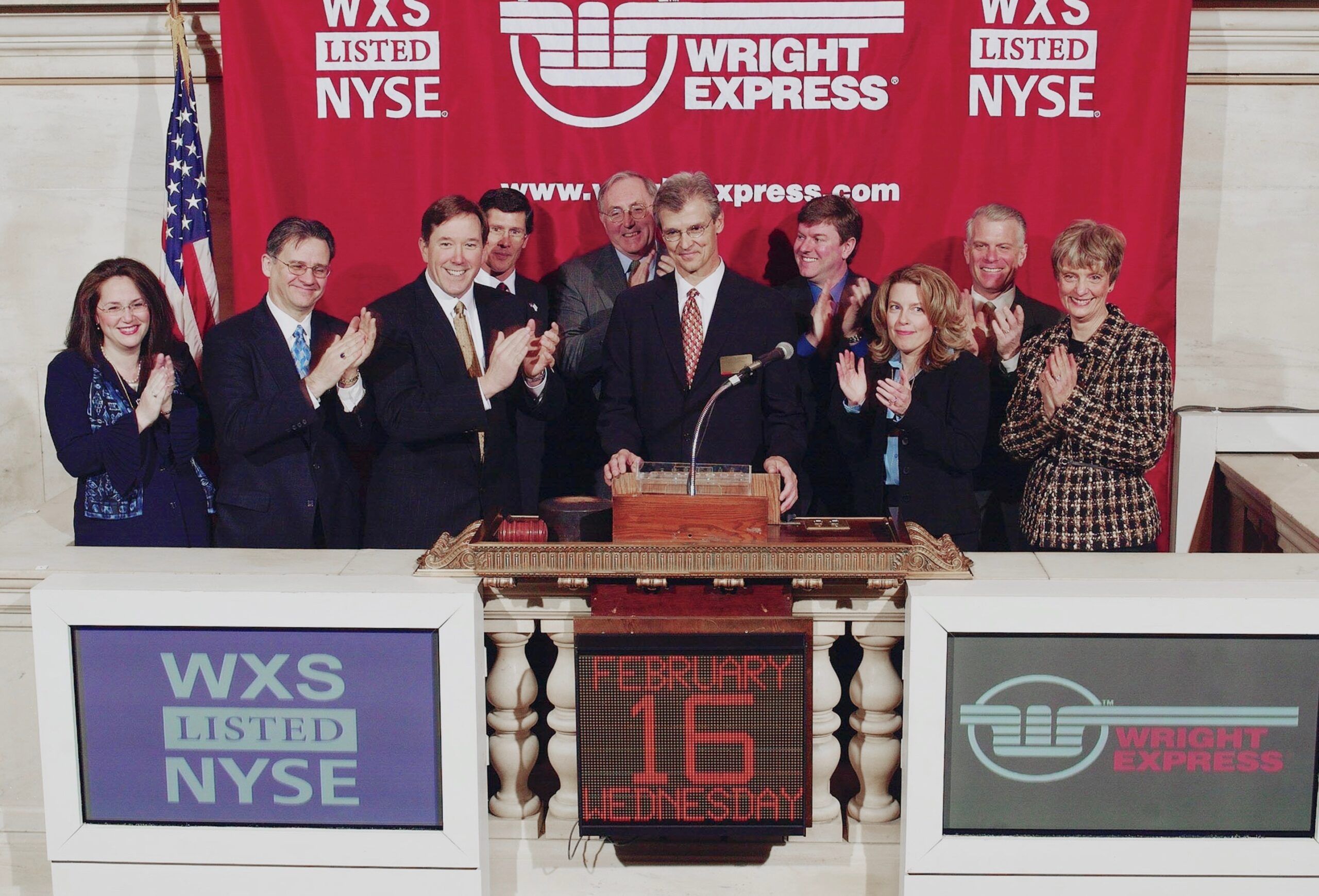 WEX executives at the NYSE on February 16, 2005, celebrating our IPO