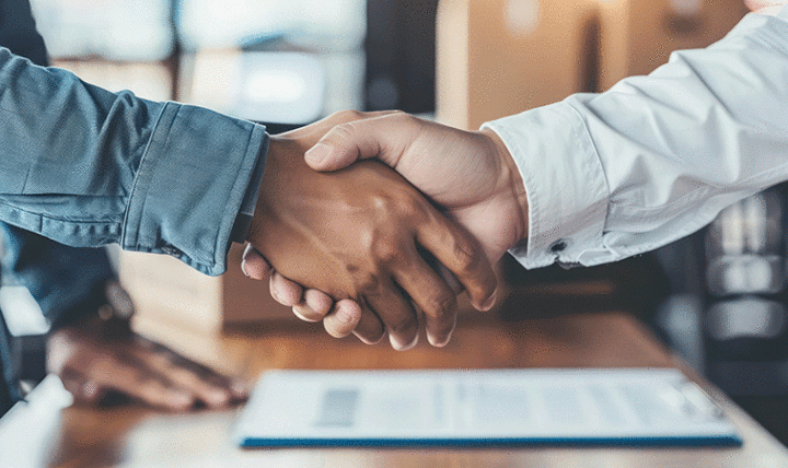 Close up hand shake