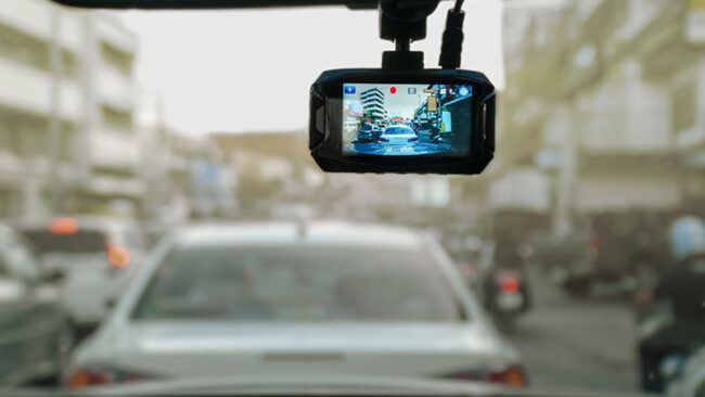 dash camera in front vehicle window