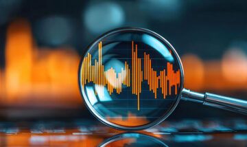 magnifying glass over volatile chart